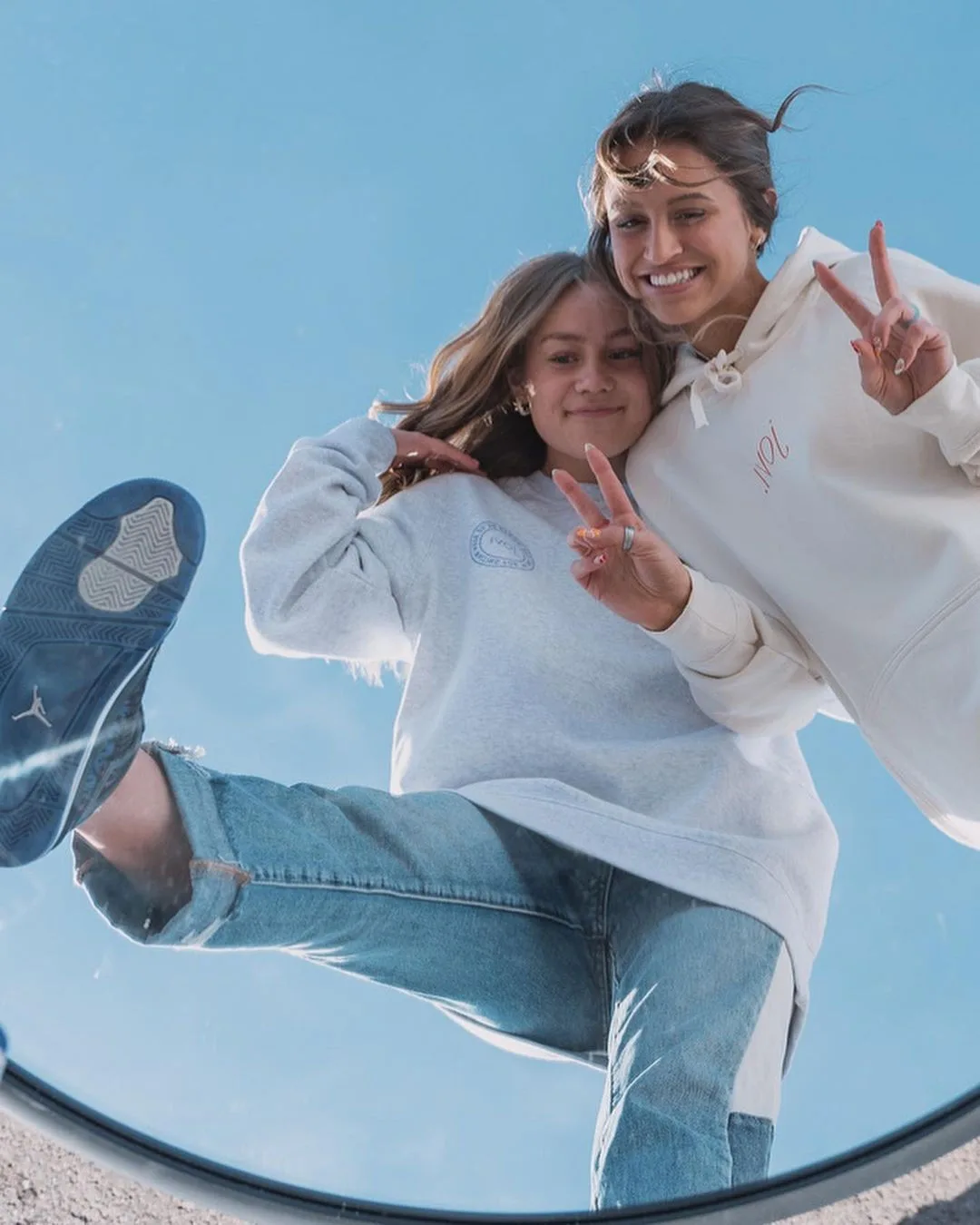 Two models in Jovi crewneck and hoodie