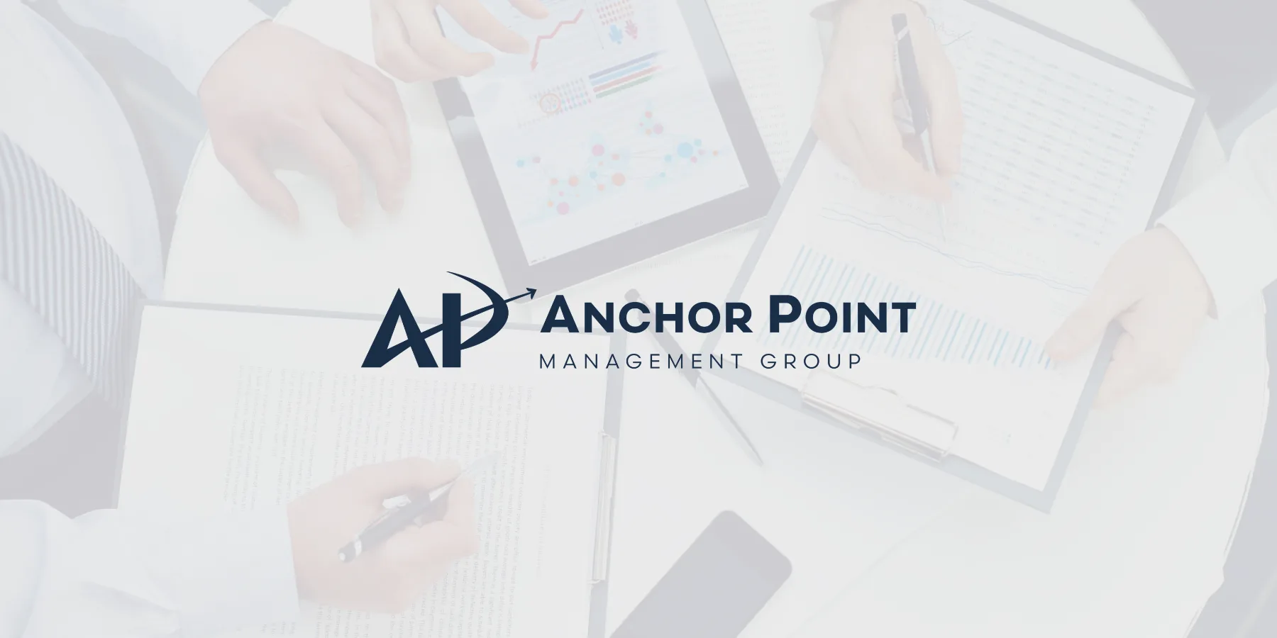Anchor Point logo over a boardroom scene
