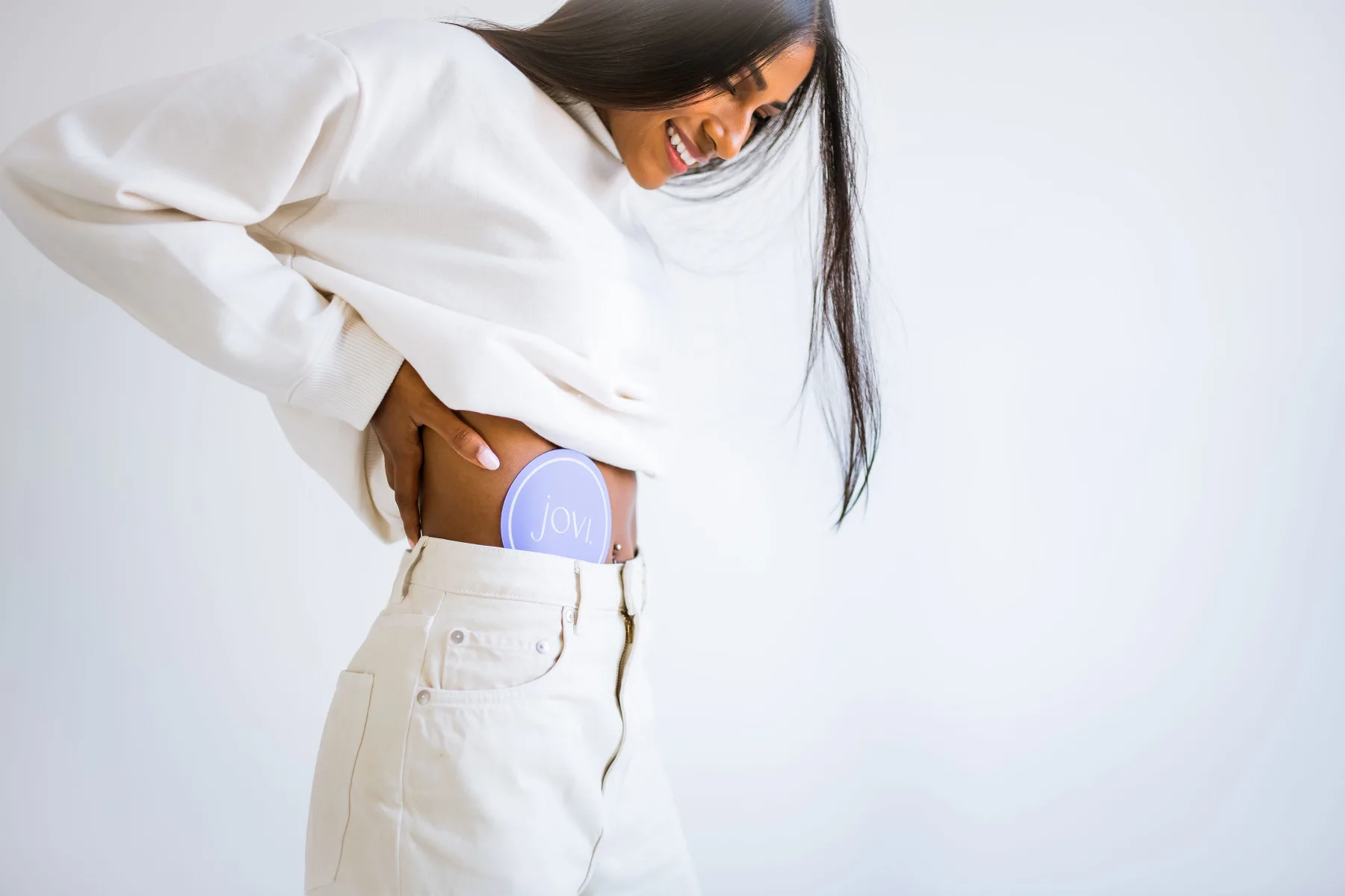 Model with coaster at waistband