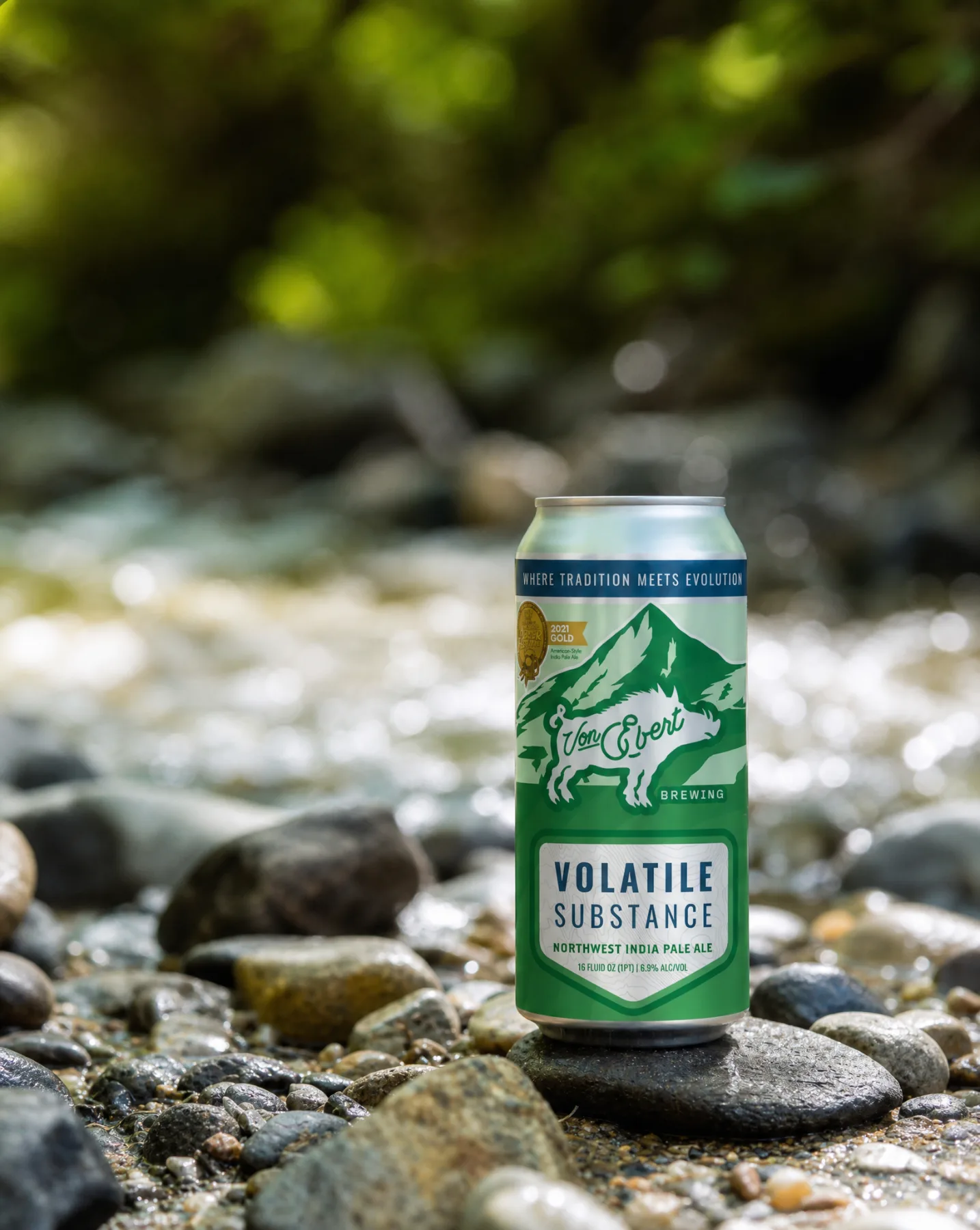 Volatile Substance can in a creek
