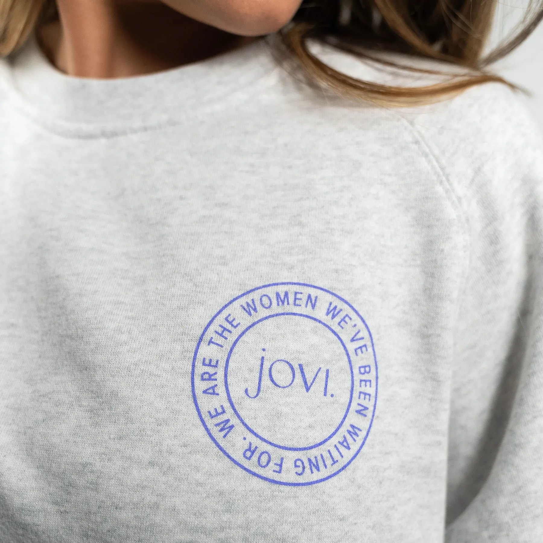 Crewneck flat lay with box and card