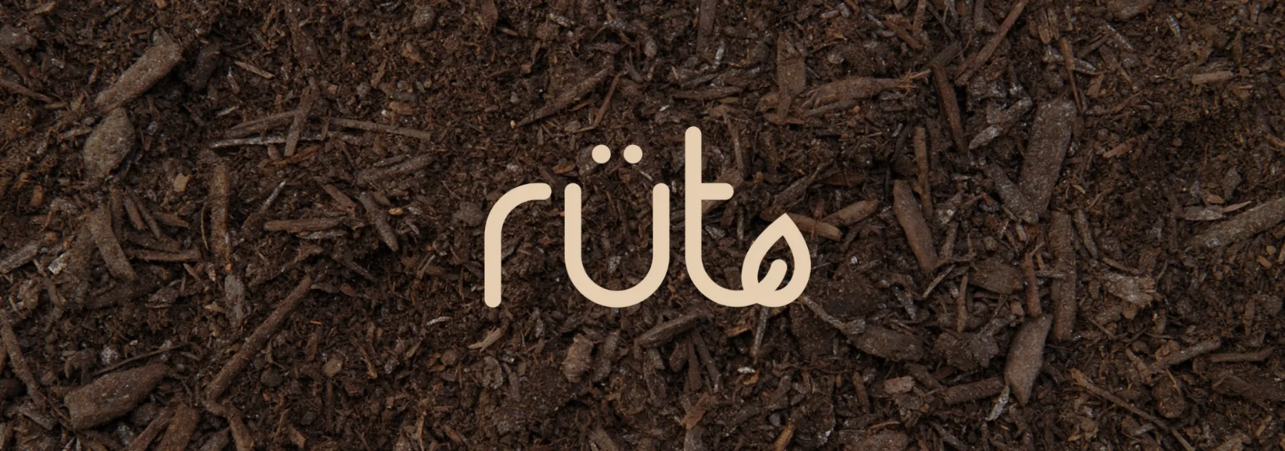 Rüt wordmark over soil